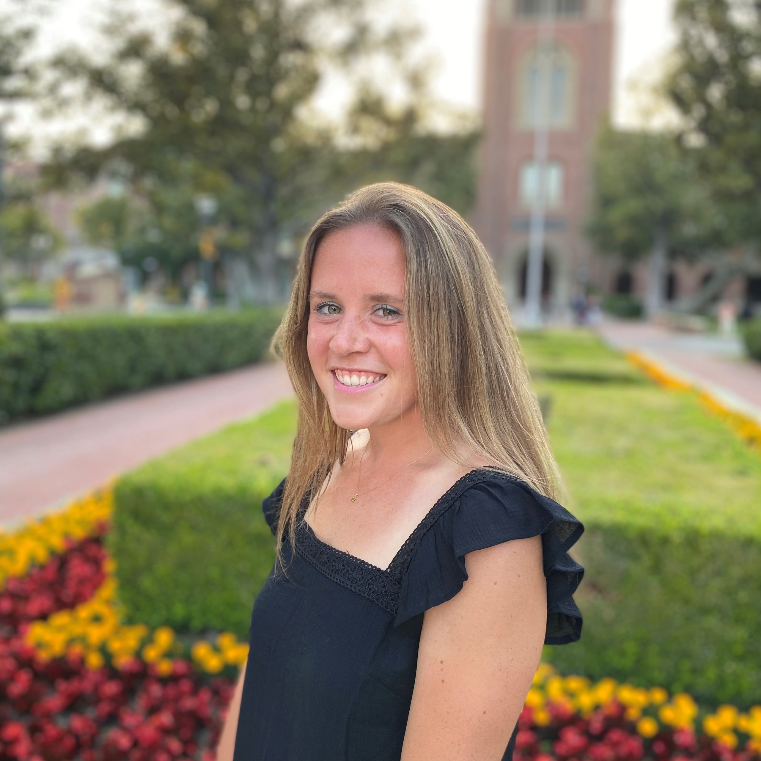 Headshot of Harper Stewart in front of USC.